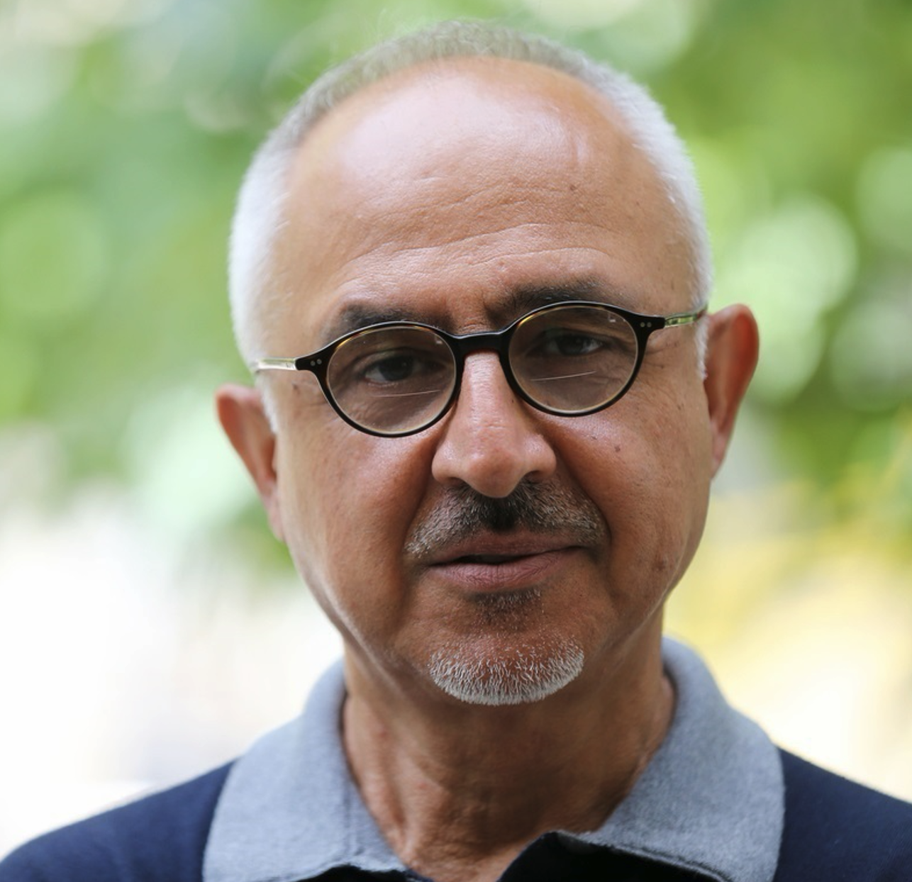 Afshin Matin-Asgari headshot.